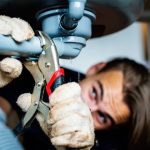 Man fixing kitchen sink