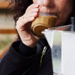 woman drinking coffee in a glass italian coffee m-2024-12-01-23-25-32-utc (1)